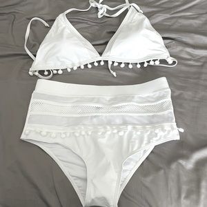 Brand new two piece white bathing suit, never worn.